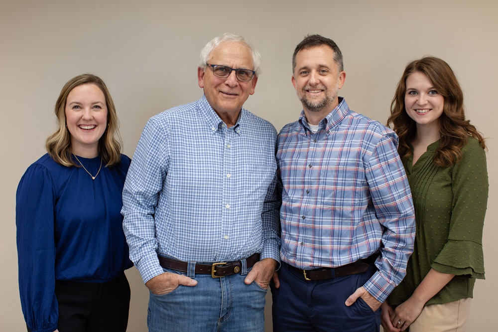 Trusted Eye Care Professionals - McMillin Eyecare Dr. Katherine Randolph, Dr. William C. McMillin, Dr. Billy McMillin, and Dr. Brenna Jeffries stand together, smiling warmly. - McMillin Eyecare